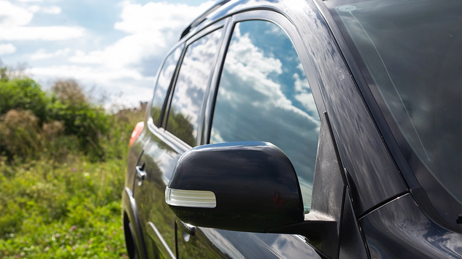 What do you call the side windshield of a car?